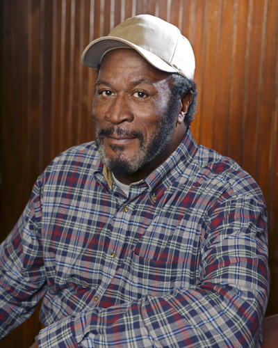 Amos, John [Men in Trees] Photo